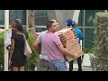 People show up in Surfside unsolicited to drop off food, supplies for those grieving