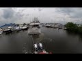 Moving a (working) 100’ vessel with 2 towboats through a narrow opening on a windy day.