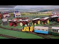 Bachmann Yellow Rheneas Pulling green , 1 blue coaches and blue box van