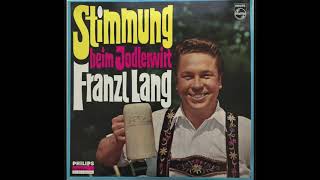 Das Alpenglühn im Herzen
Franzl Lang
1930 - 2015
Franz Franzl Lang (28 December 1930 – 6 December 2015), known as the Yodel King (German: Jodlerkönig), was an alpine yodeler from Bavaria, Germany. Lang also sang and played the guitar and the accordion and appeared in several German films of the 1960s.
During his career, Lang sold more than 10 million recordings; he earned 20 gold records and one platinum record awarded by the German recording industry.
Album
Stimmung beim Jodlerwirt (1967)
A Good Time at the Jodlerwirt (a small alpine restaurant in the heart of Munich is still open in Munich)
For this album Lang performs with a few different brass bands giving the album a traditional Blasmusik (brass band) sound.
Producer: Carlos Diernhammer
Engineer: Egon L. Frauenberger
Song
Das Alpenglühn im Herzen - I have the Glow of the Alps in my Heart
Lang can travel all over, but ultimately returns to the Alps because he has the Alpine glow in his heart. Das Alpenglühn im Herzen