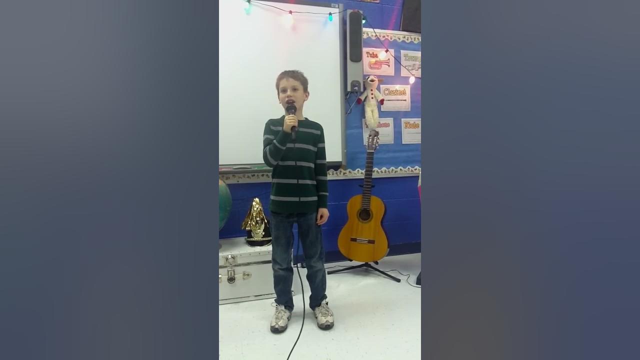 Houston singing "Christmas Shoes"