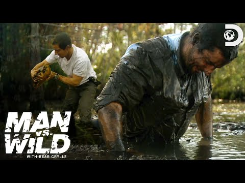 Bear Grylls Demonstrates How to Escape a Mud Sinkhole | Man vs. Wild