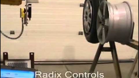 Automated nut runner guidance using vision for tire fastening