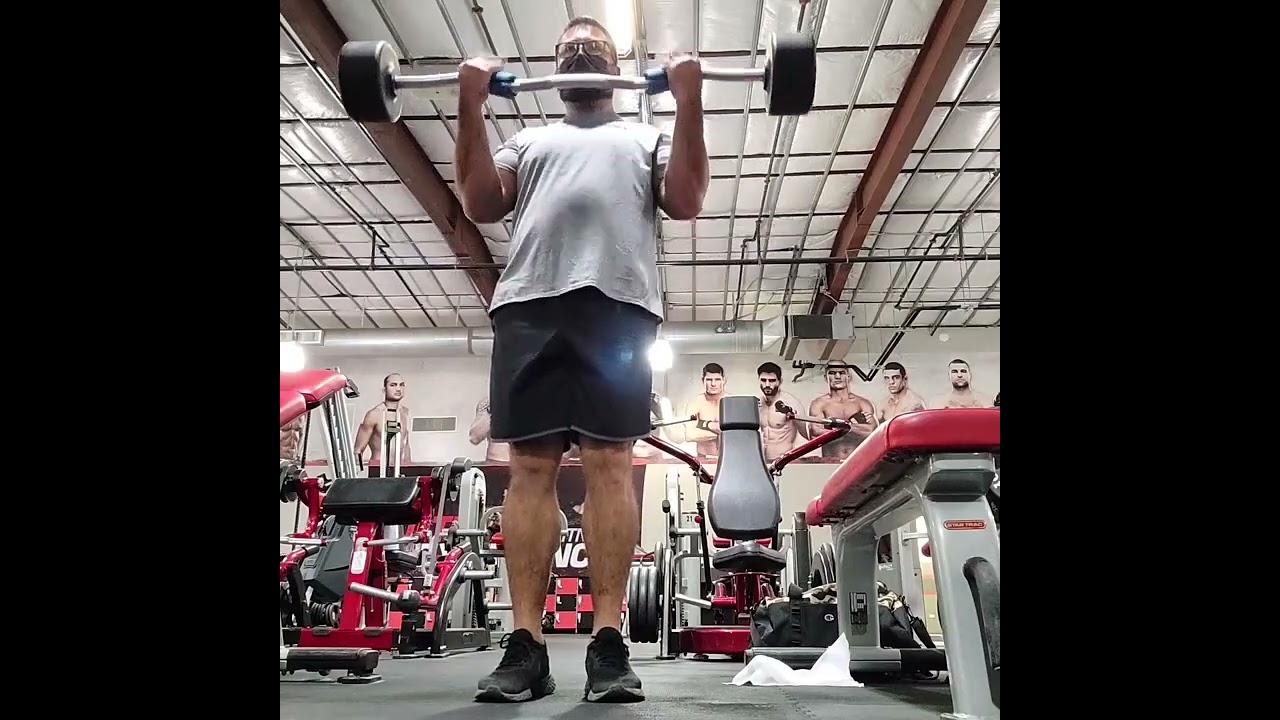 Doing 90lb curls with the fat grips. Arms are blown!