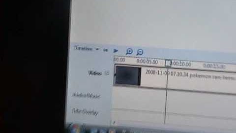 how to mute and put music on windos movie maker