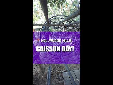 CAISSON DAY!! You've seen the holes dug by hand. Time to lay the Caissons for this retaining wall.