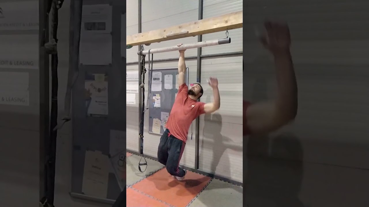 One arm pull-up on a fat bar!