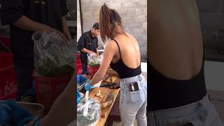 She Cooking Spicy Issan Soup with Beef -Thai Street Food