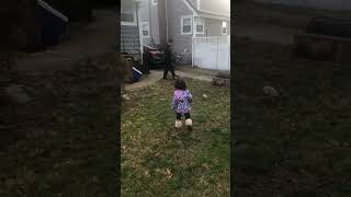 Woman kicks ball that hits girl on head