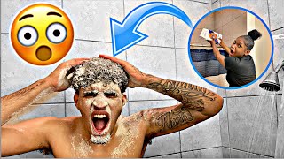 Pouring FLOUR On My BOYFRIEND While He&#39;s In The SHOWER PRANK! *HE GETS MAD*