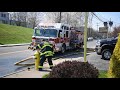 Fire department responding to a fire behind abandoned factory structure 2021