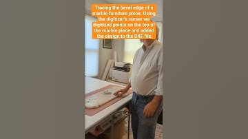 Tracing the bevel edge of a marble furniture piece.