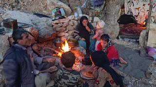 Building a place for fire by Ali and collecting firewood by his daughters