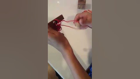 Ring and string puzzle solution, by Dilemma games