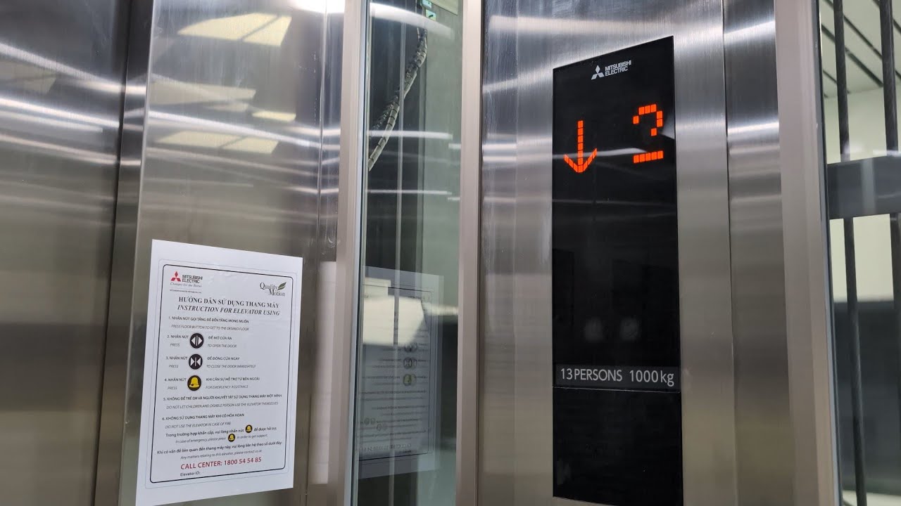 Mitsubishi elevator at Tan Son Nhat International Airport Terminal 3, Saigon, Vietnam