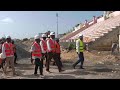 Le president augustin senghor en visite au chantier du stade demba diop de dakar ce mardi 10 octobre