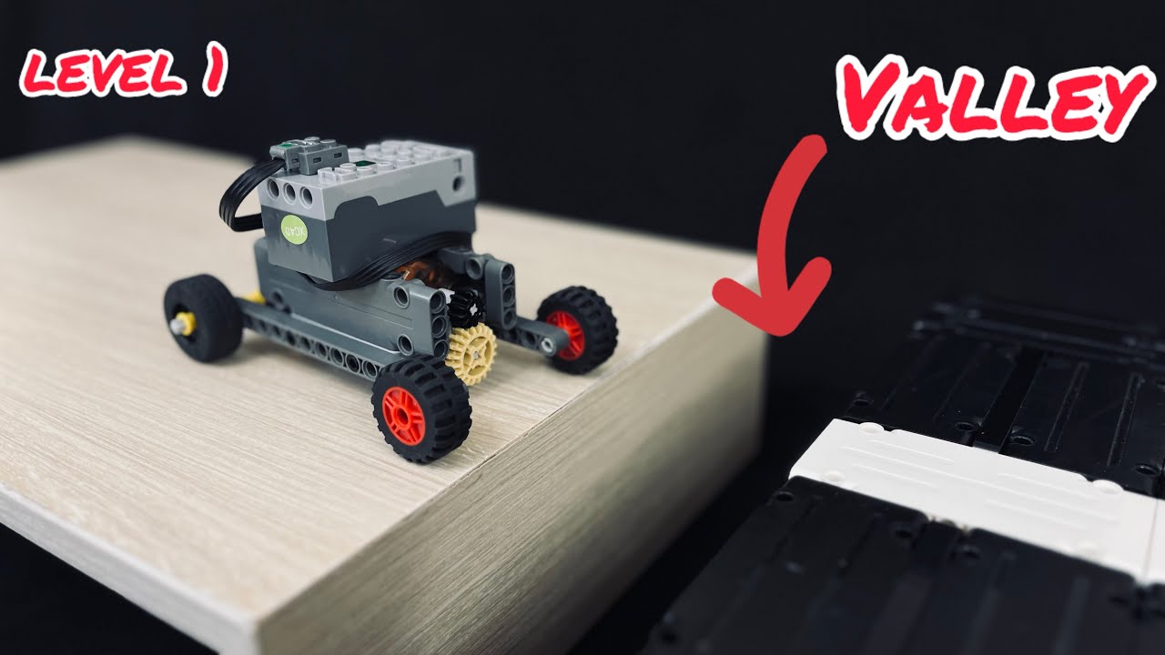 Crossing the valley with a LEGO car , How far can it go?