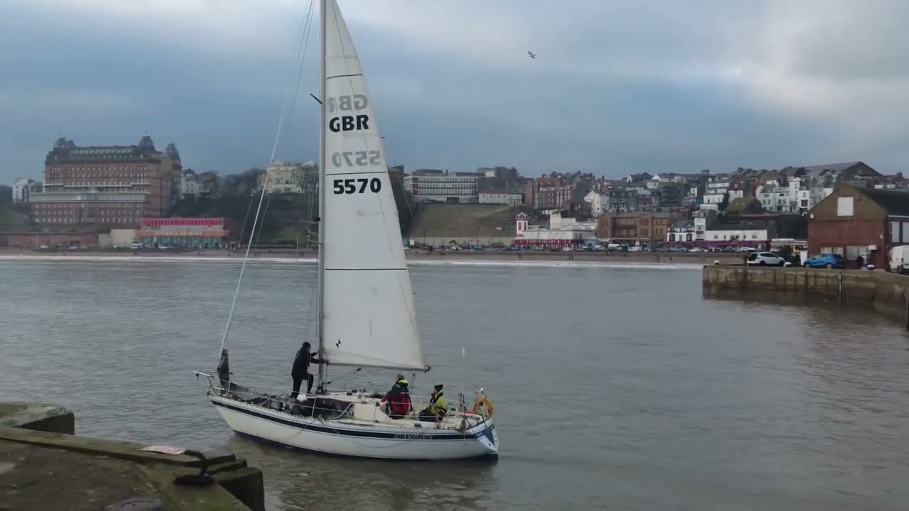 Yachts going out from Scarborough Harbour