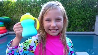 Alisa and Eva play Summer Games in the Pool with Fun Baby Shark Dance