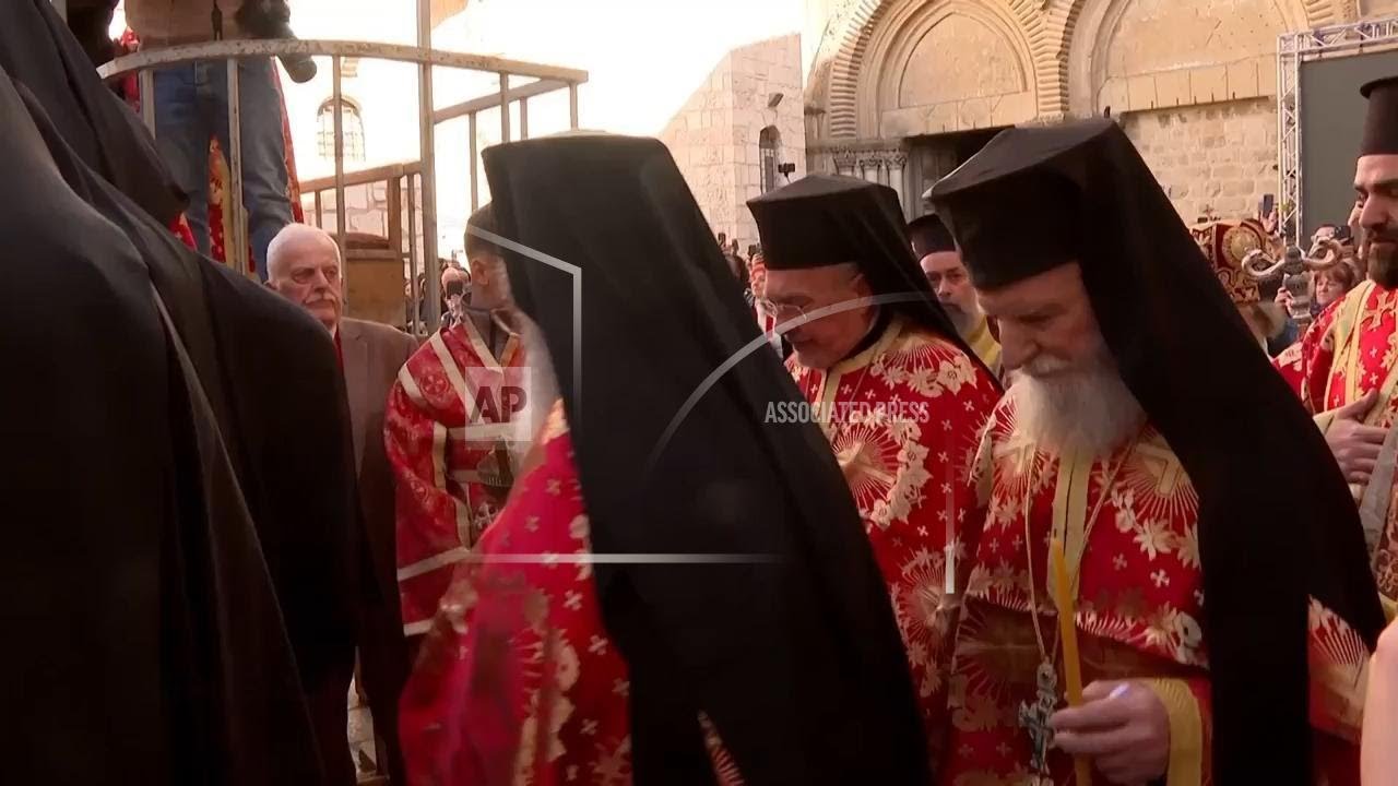 Greek Orthodox Patriarch of Jerusalem washes feets pf priests to mark Easter's holy week