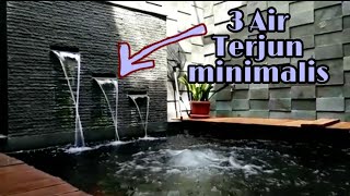 bangun kolam air terjun sederhana depan rumah yang indah