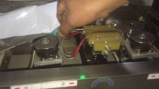 Film setting for flow packing machine