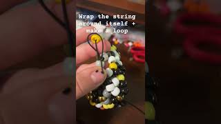 Celebrity Tying off an x-base cuff #kandi #bracelet #tutorial #kandikid Net Worth