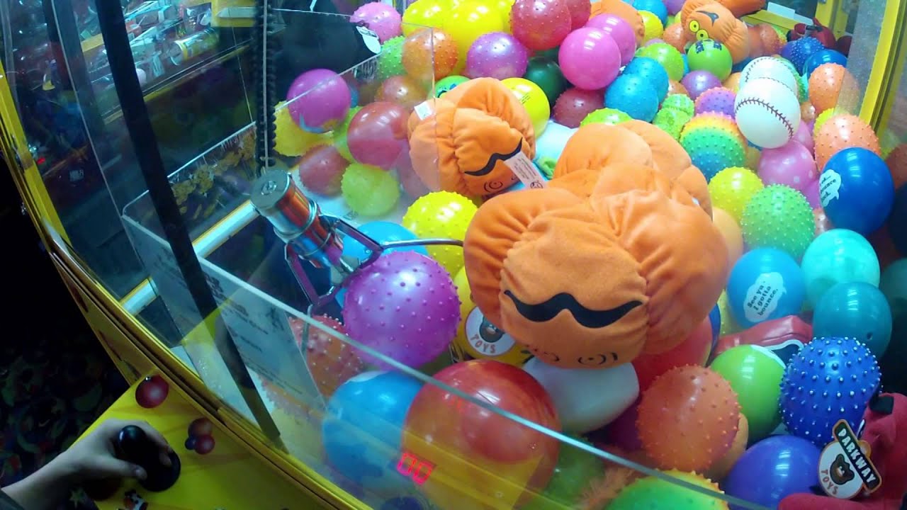 102 WINNING at the claw machine Ballz! YouTube