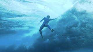 Below - Arnaud Jerald bodysurfing under Tahiti waves