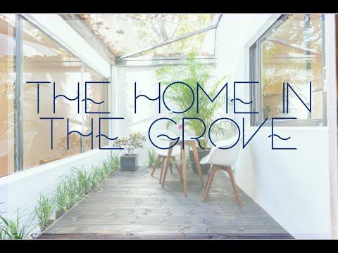 The Home in the Grove 3/2 +office with custom atrium