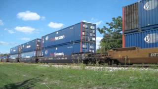UP 7780 & 5048 lead a Pacer Stack Train with a bit of a horn show