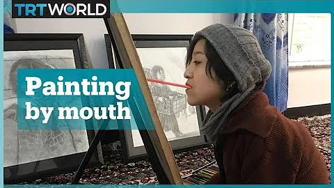 Afghan painter drawing with her mouth