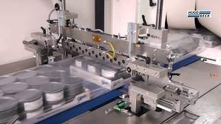 Hugo Beck - Shrink wrapping of tuna cans in trays