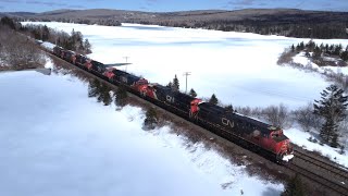 Awesome Aerial 4K View! Huge Power Lashup on Stack Train CN 120 Passing Folly Lake, NS