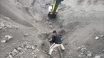 Barge unloading 5200 tons of phosphate rock - Part 3 Smooth flow - Excavator working on barge