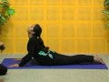 Practicing bhujanga asana cobra pose with divine wellness