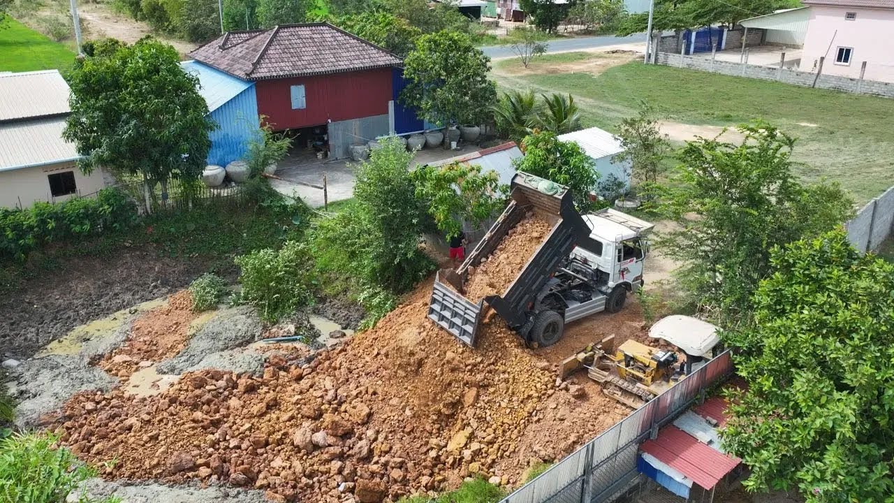 Expert Bulldozer Operator: Power Tech Soil Pushing in pond & 5-Ton Dump Truck