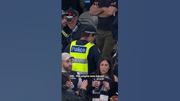 Bottle attack injures AFL umpire | 7NEWS