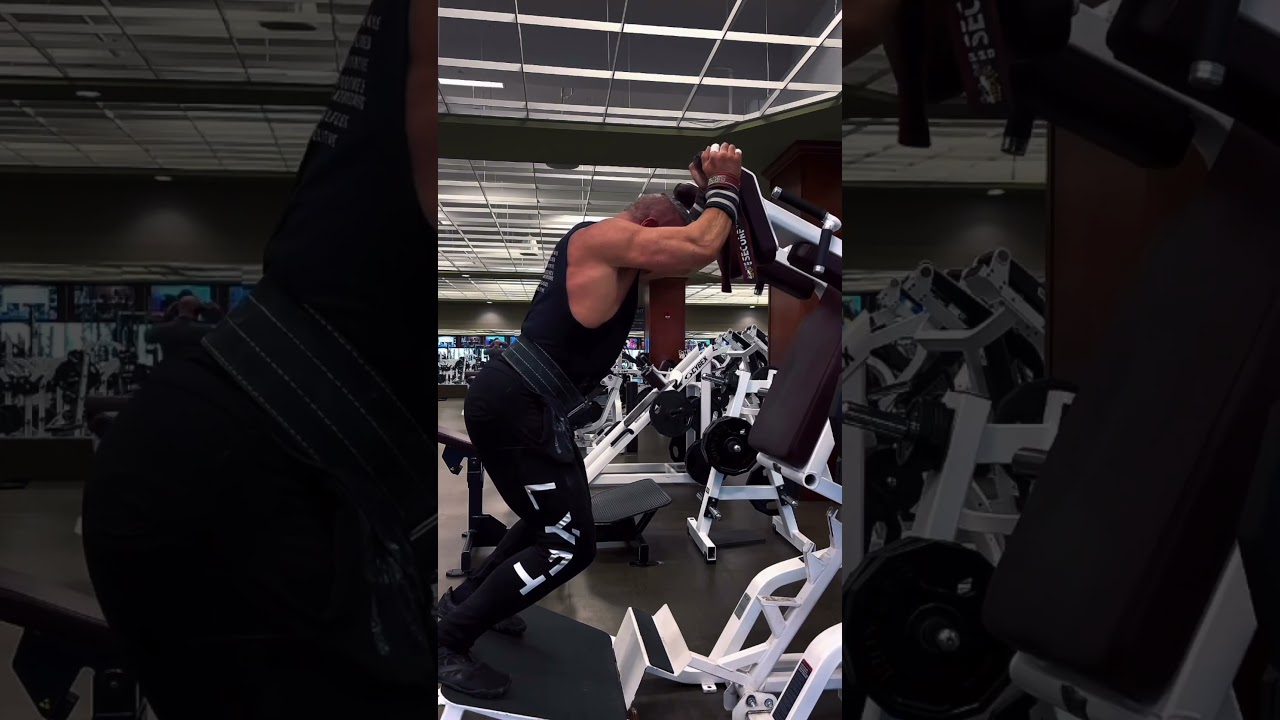 To hit your side deltoids a little harder, lean forward while pressing on the squat machine ￼