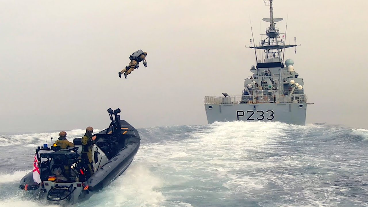 Royal Marines using jet suits to board a ship