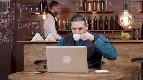 Working While Drinking Coffee Stock Video