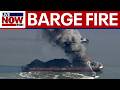 Scrap metal barge fire in Delaware River