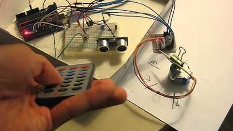 IR remote selecting multiple positions on stepper motor with interruption