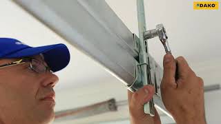 Installation de porte de garage sectionnelle DAKO - Guidage LHF Panneau 40mm - BF Menuiseries