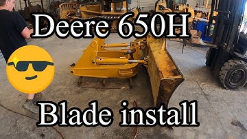 Part 2 of blade work on Deere 650H dozer installing new blade and c frame
