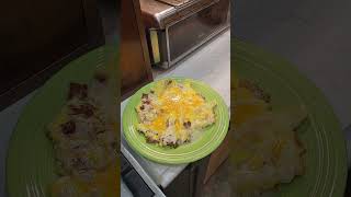 Eggs, bacon and melted cheese.