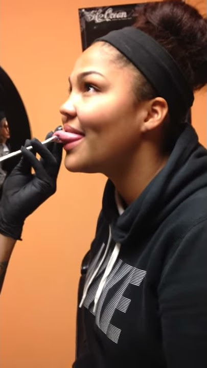 Snake eye tongue piercing