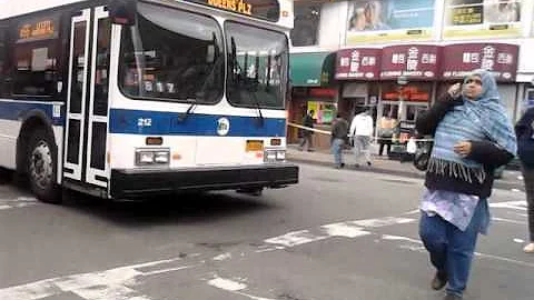 2011 New Flyer C40LF 212 on the Q66 departing Roosevelt Avenue & Main Street
