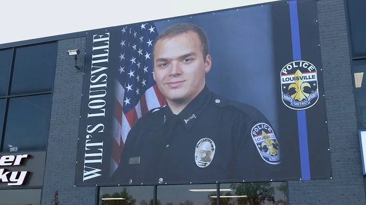 Banner honoring LMPD Ofc. Nick Wilt unveiled on Louisville building