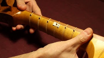 Tighten a viol fret (loop kind)